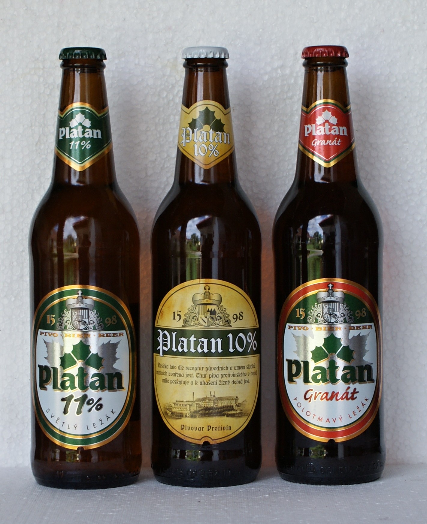 Three Czech Platan beers with degree-strength labels, directly illustrating Czech beer degrees.