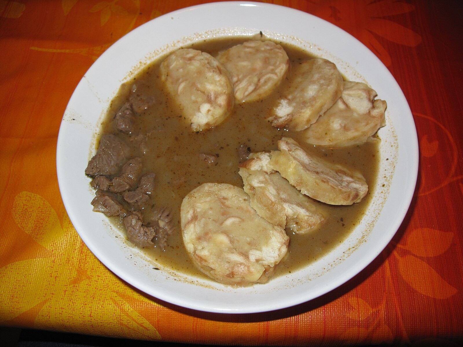 Czech venison goulash served with dumplings.