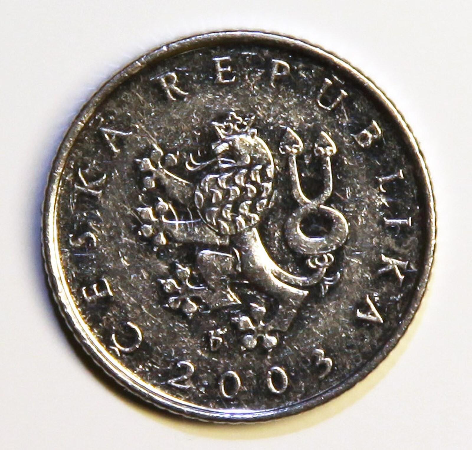 Obverse of a Czech 1 Kč coin with the Czech lion and “ČESKÁ REPUBLIKA” visible.