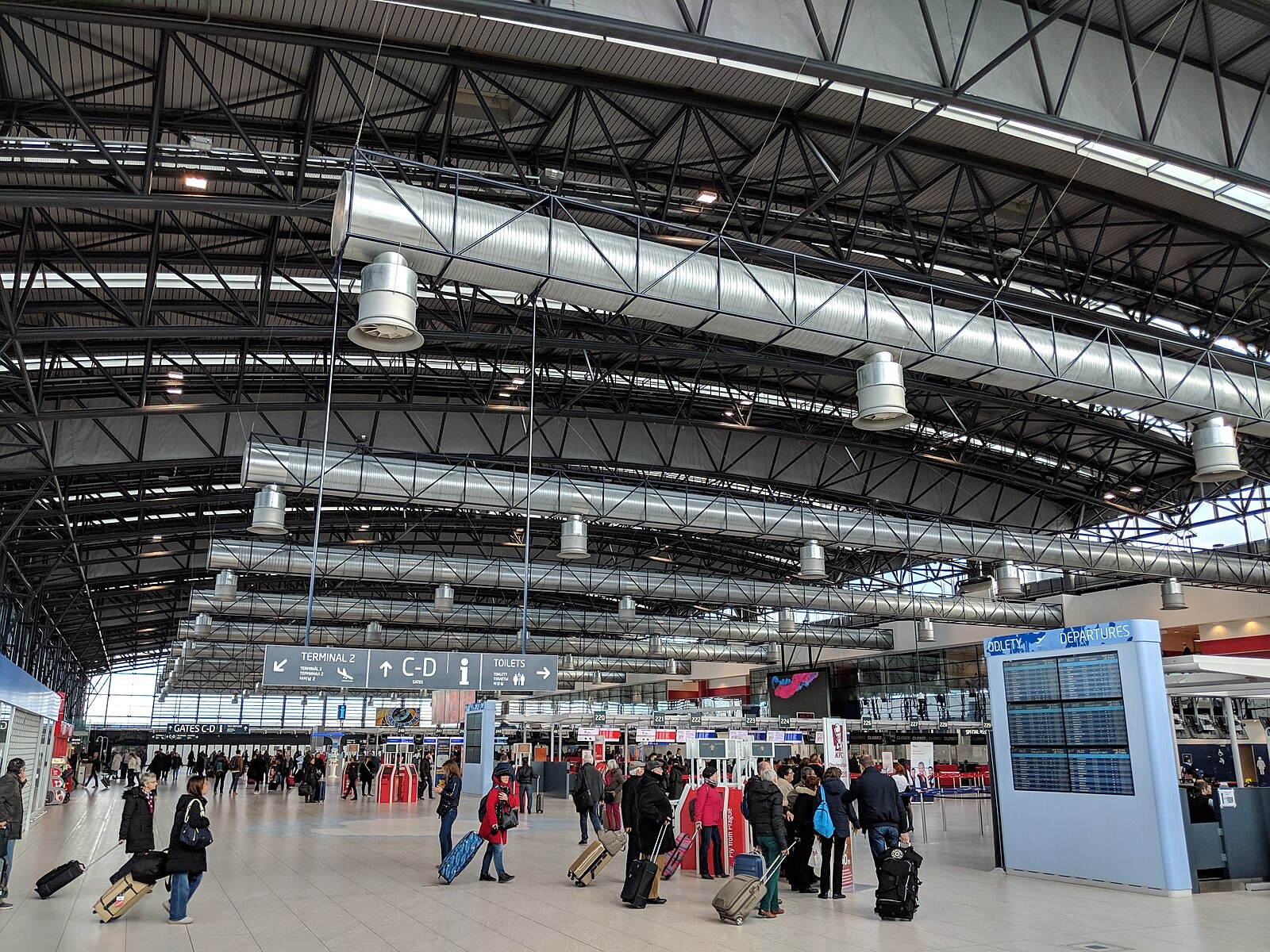 Interior of Prague Airport Terminal 2 departures area.