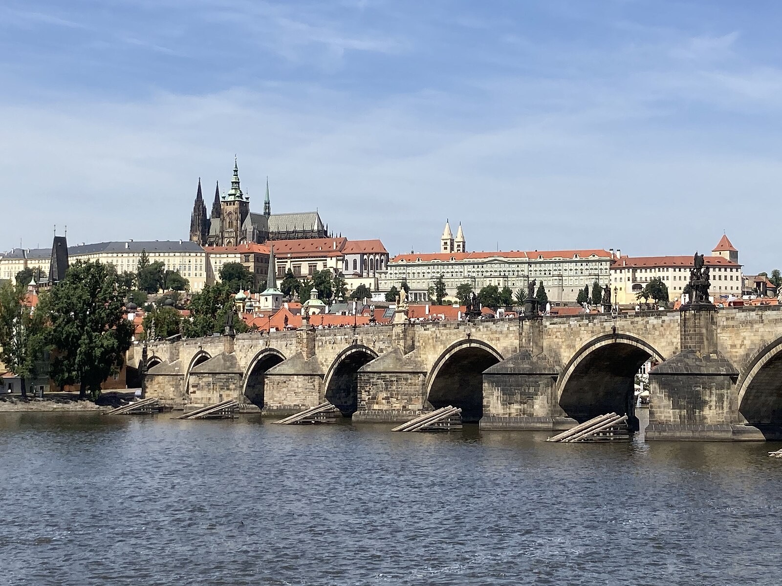 Prague Castle and St Vitus Cathedral behind Charles Bridge and the Vltava.
