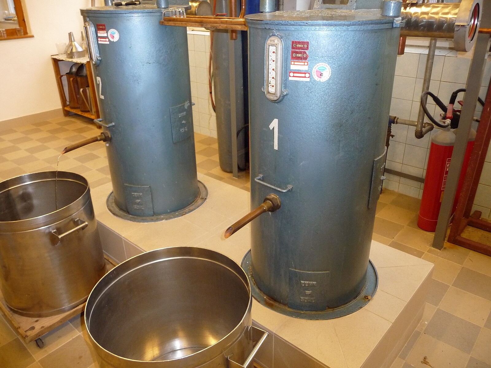 Fresh slivovitz at a Czech pálenice/distillery, showing production culture rather than only retail bottles.