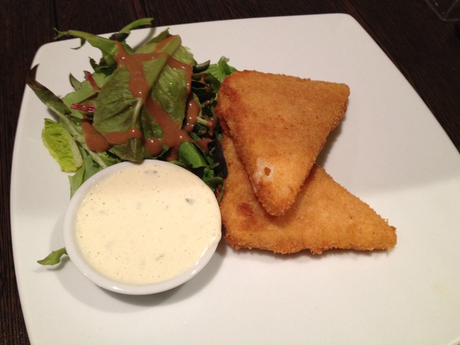 Breaded fried cheese in Czech serving style.