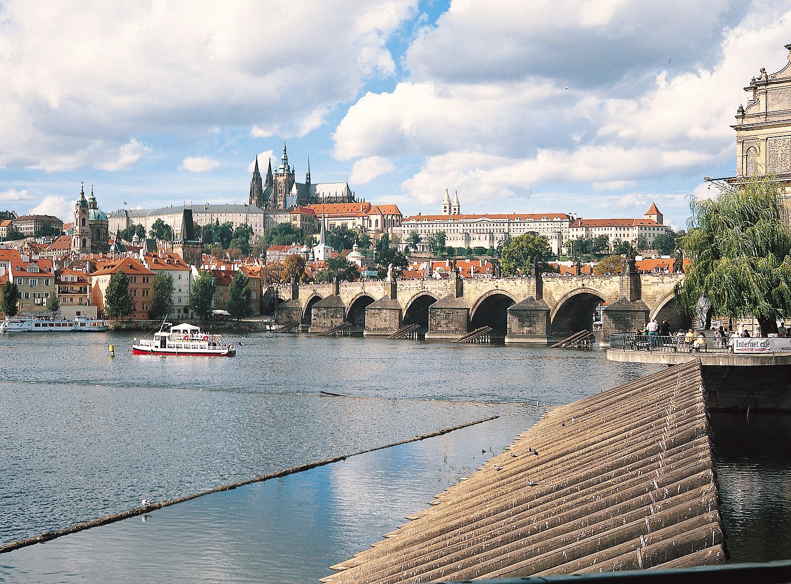 Classic Prague panorama with Castle, Charles Bridge and the Vltava.