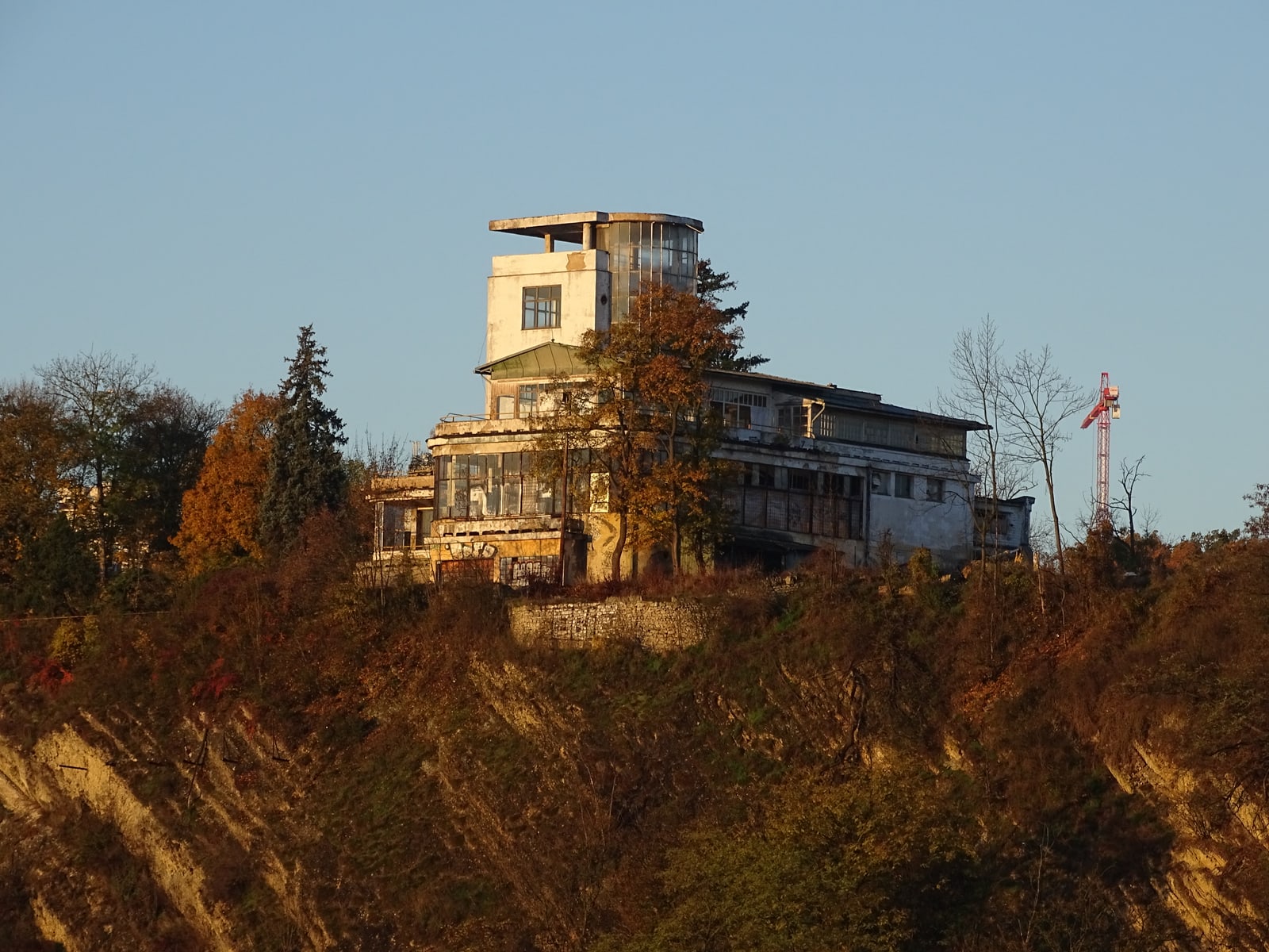 Wide modern view of the Terraces from Barrandov Bridge, showing cliff and urban setting.