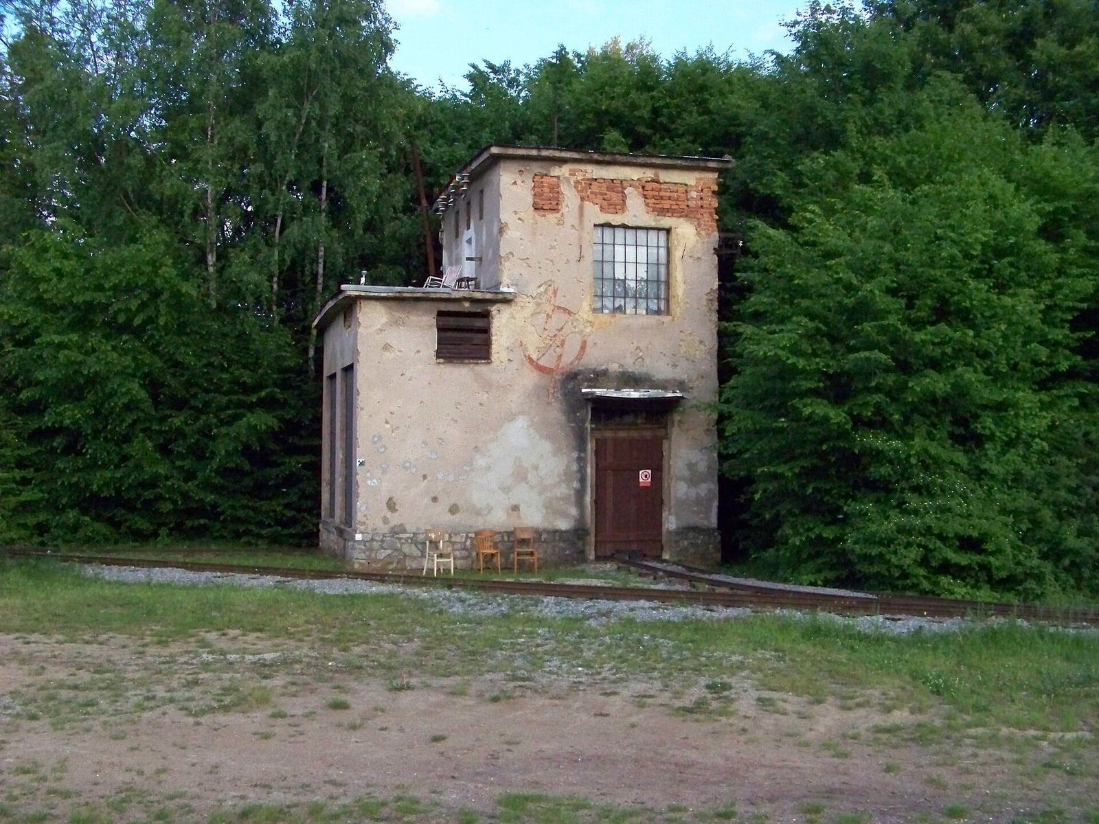 Mining railway and industrial building at the Solvay Quarries open-air museum.