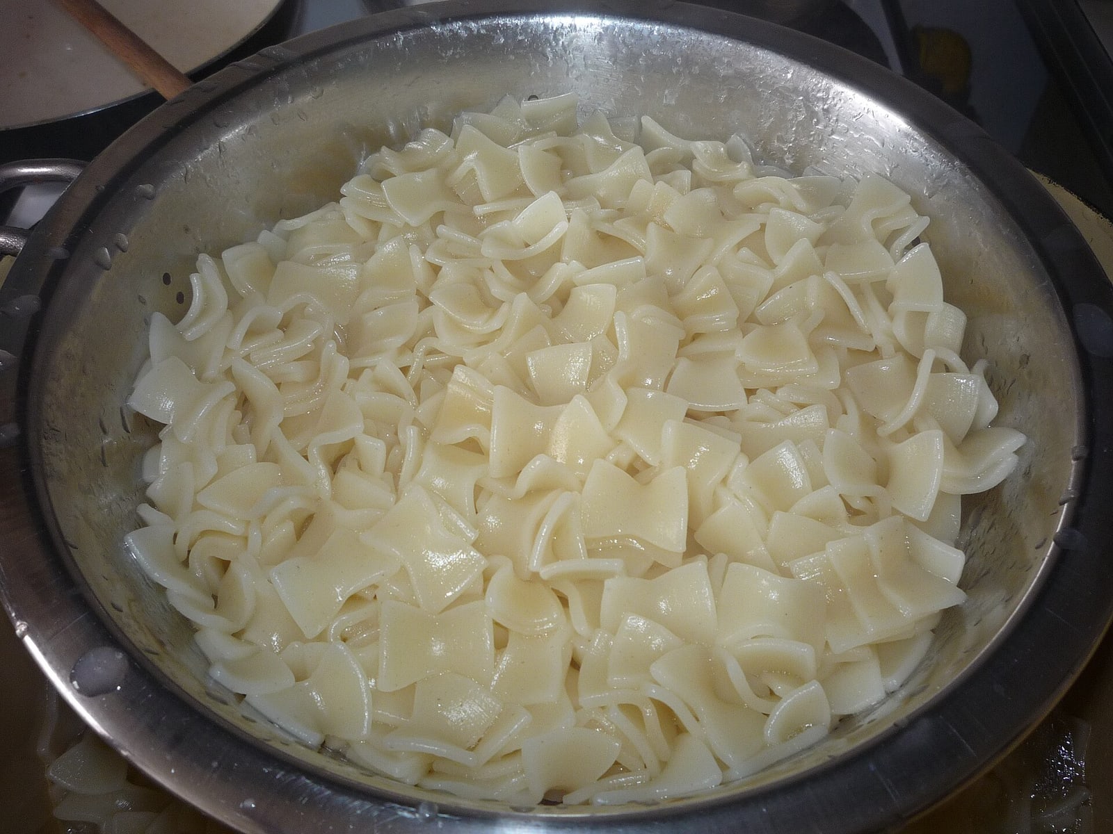 Close-up of the square fleky pasta used in the dish.
