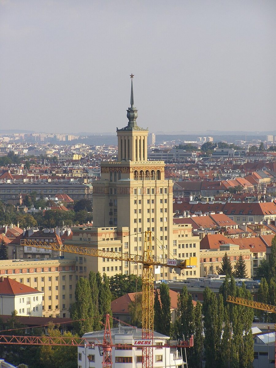 Full distant portrait of Hotel International, its central tower and wings clearly readable.