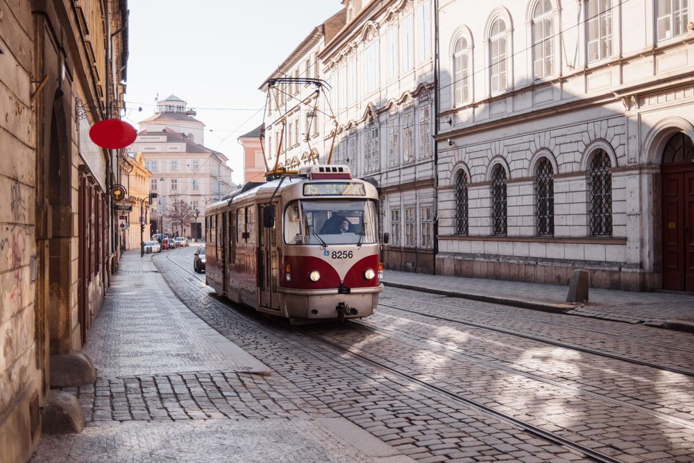 Approved Prague rail/public-transport corridor with urban architecture, used as contextual infrastructure visual.