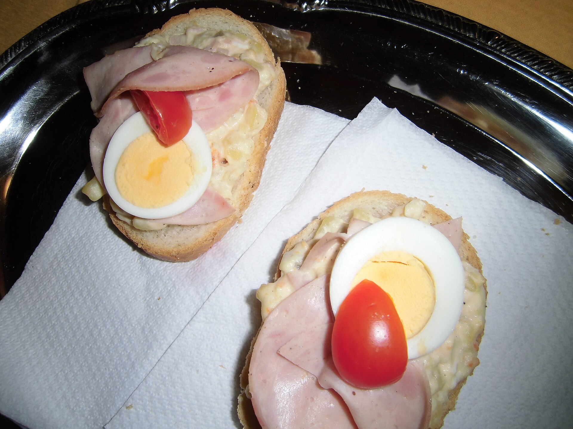 A classic Czech chlebíček showing the decorated open-faced presentation.
