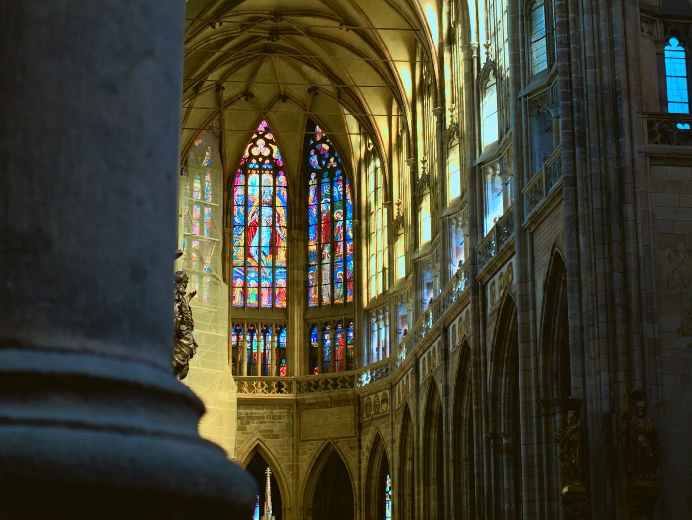 A verified Prague Gothic interior visibly shows strong verticality.