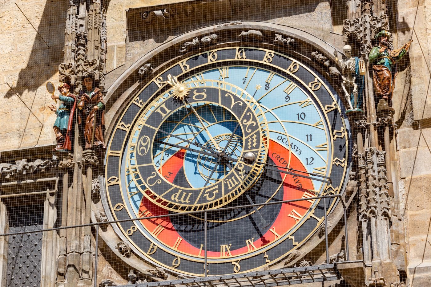Detailed exact close-up visibly shows Prague Astronomical Clock dials, sculpture and ornate mechanism façade.
