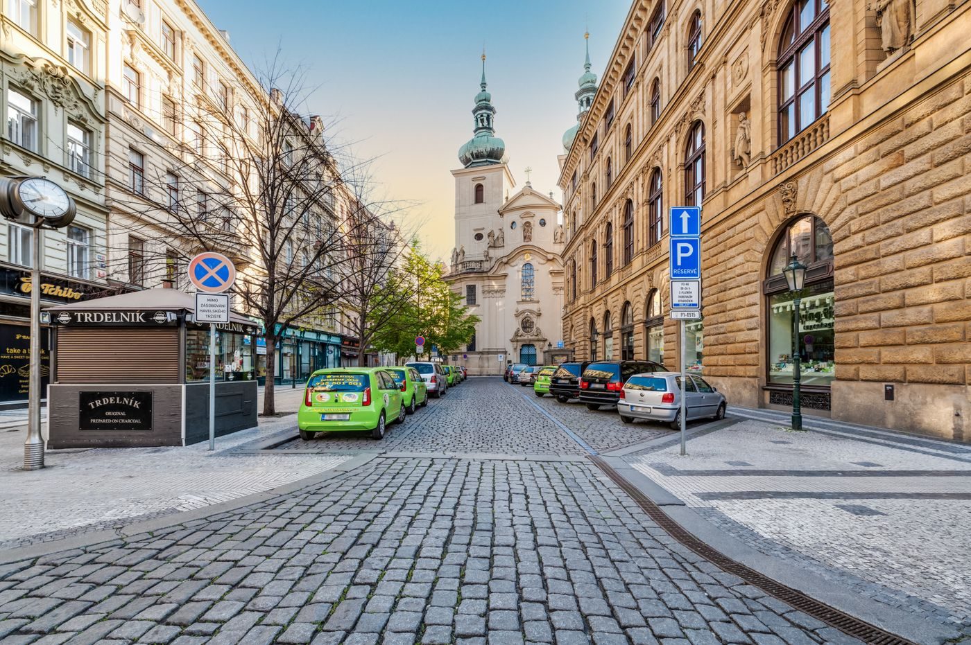 Tight Old Town Prague lane and narrow parcel rhythm are visibly shown.