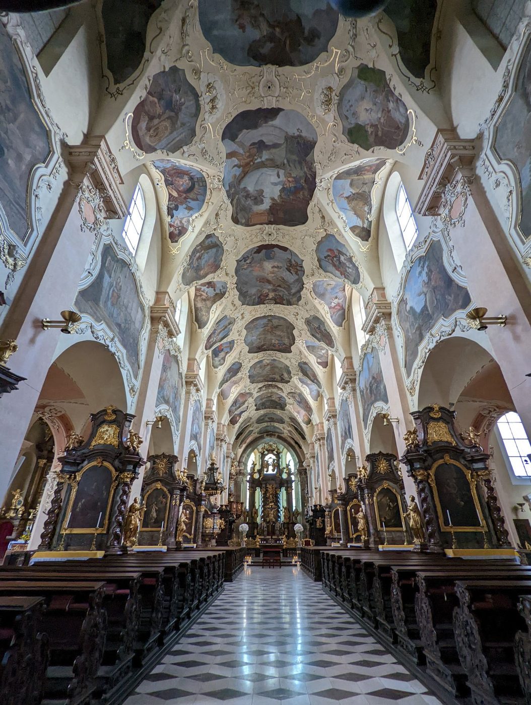 Exact Strahov Monastery basilica interior is visibly ornate.