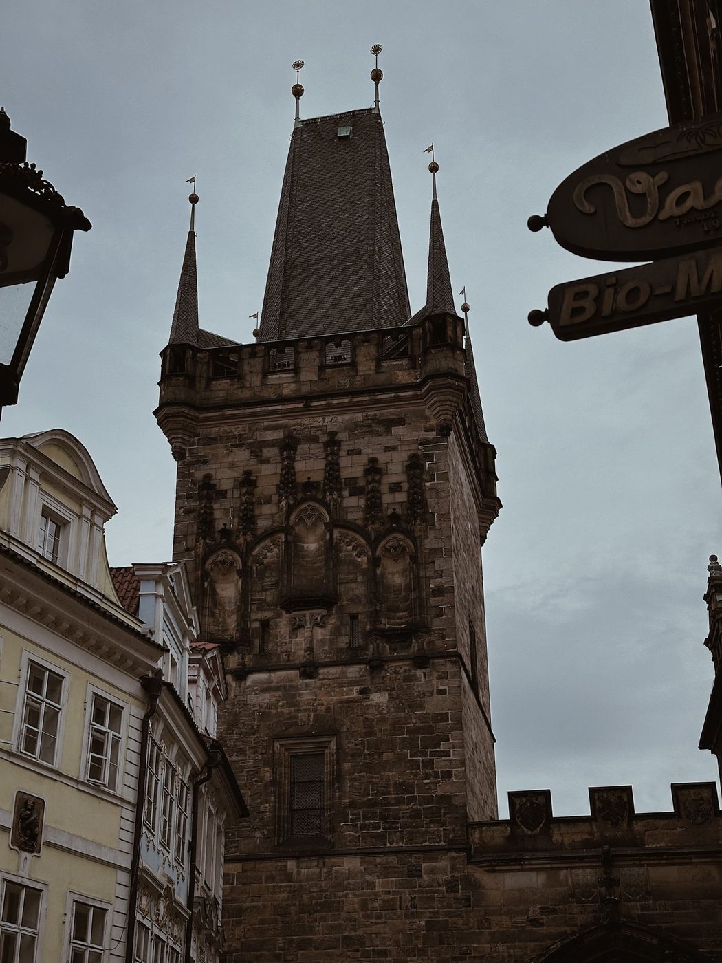 Lesser Town Bridge Tower is visibly identifiable at the Charles Bridge approach.