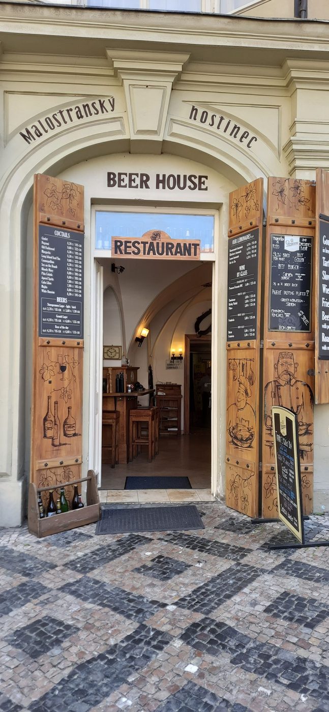 Prague food-and-drink venue context is visibly shown.