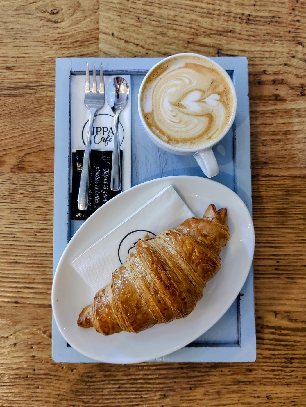 An exact Prague café serving is visibly shown.