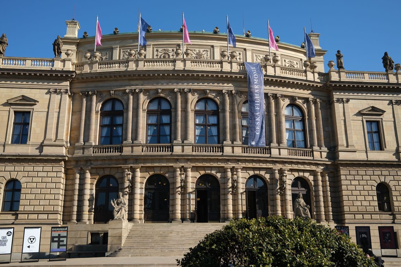 Exact Rudolfinum façade is visibly shown frontally in Prague.