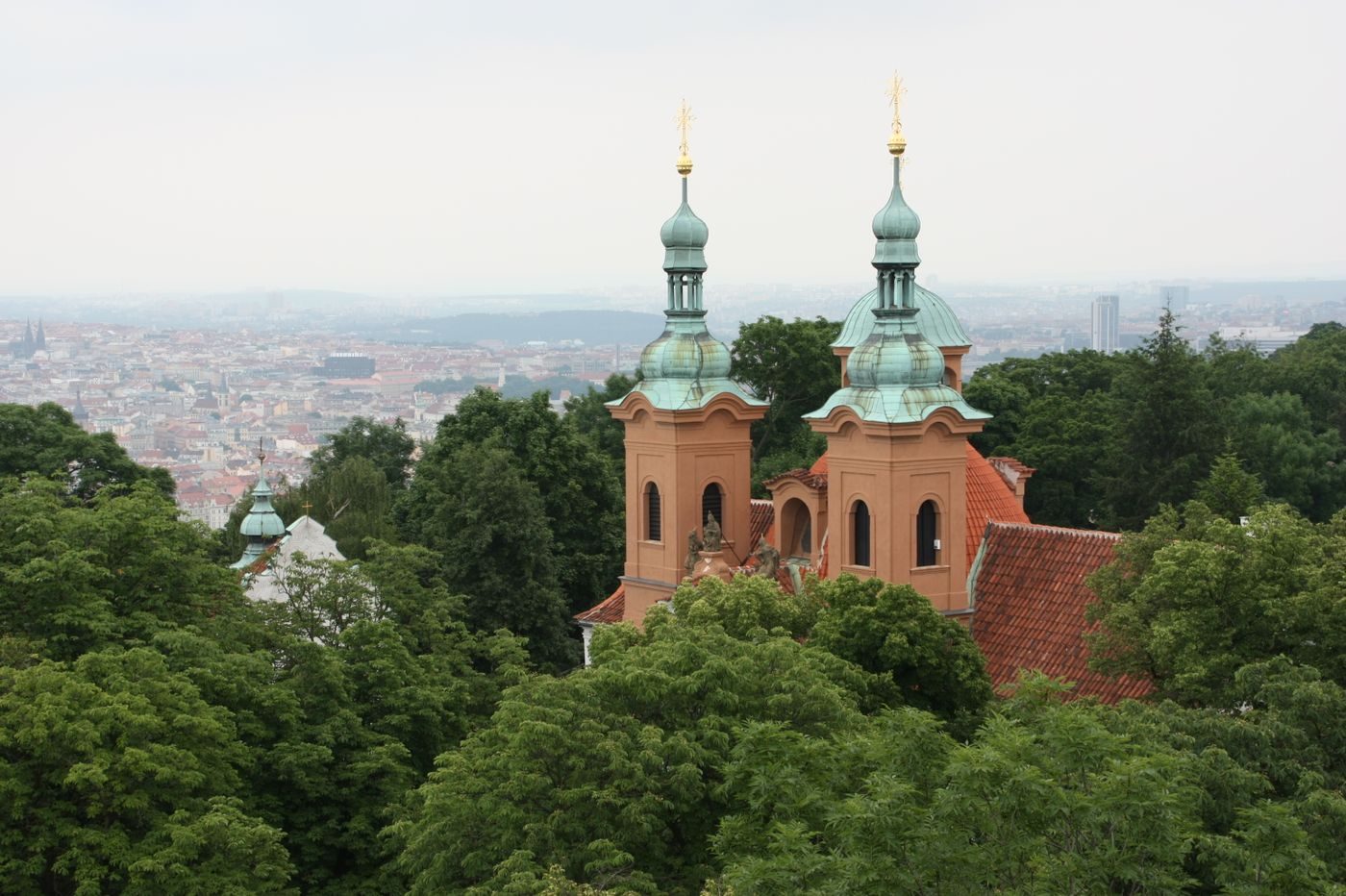 Exact Loreta Church complex is visibly identifiable from above against the Prague skyline.