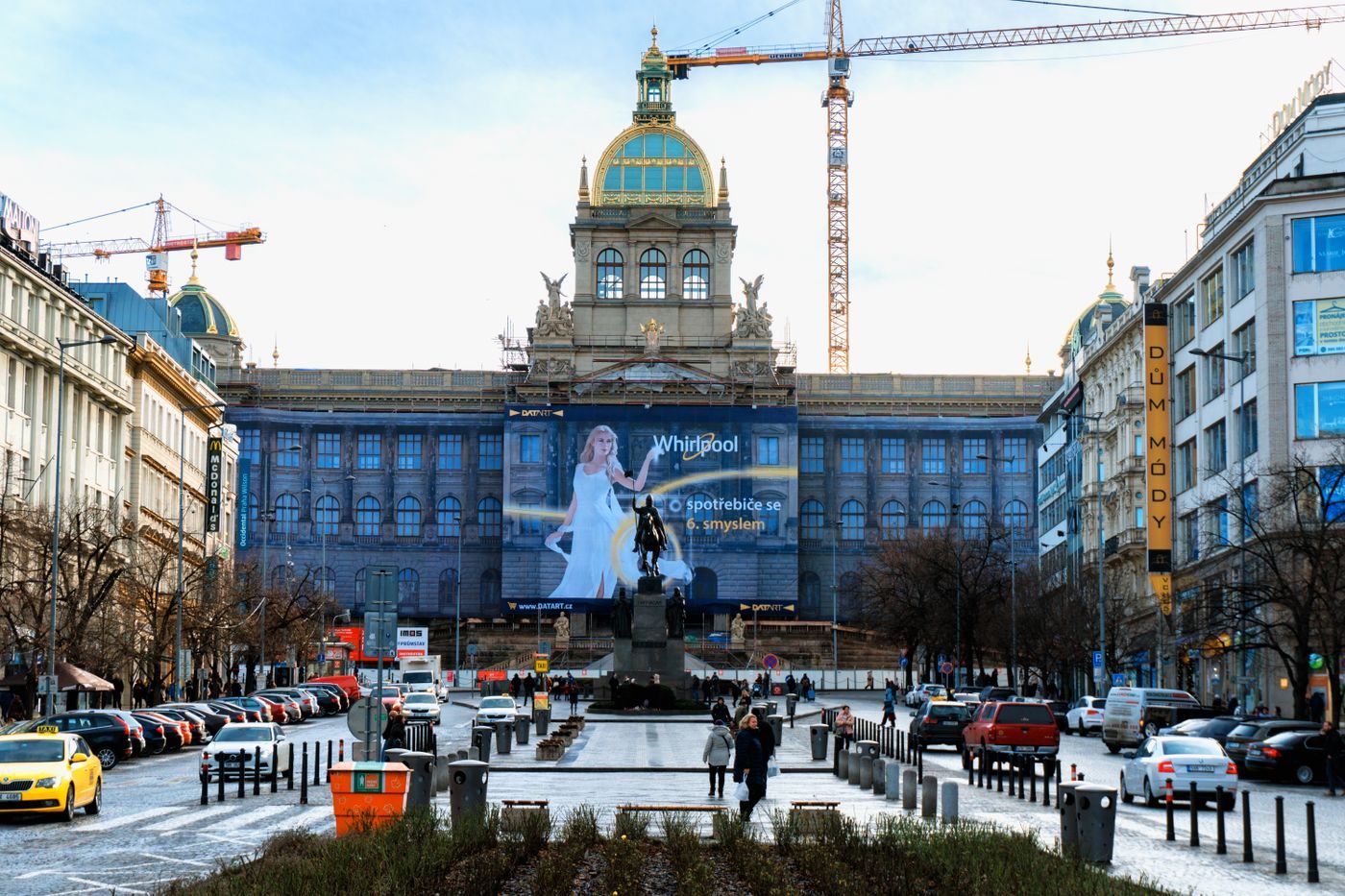 Wide Wenceslas Square visibly reads as a long public urban room.