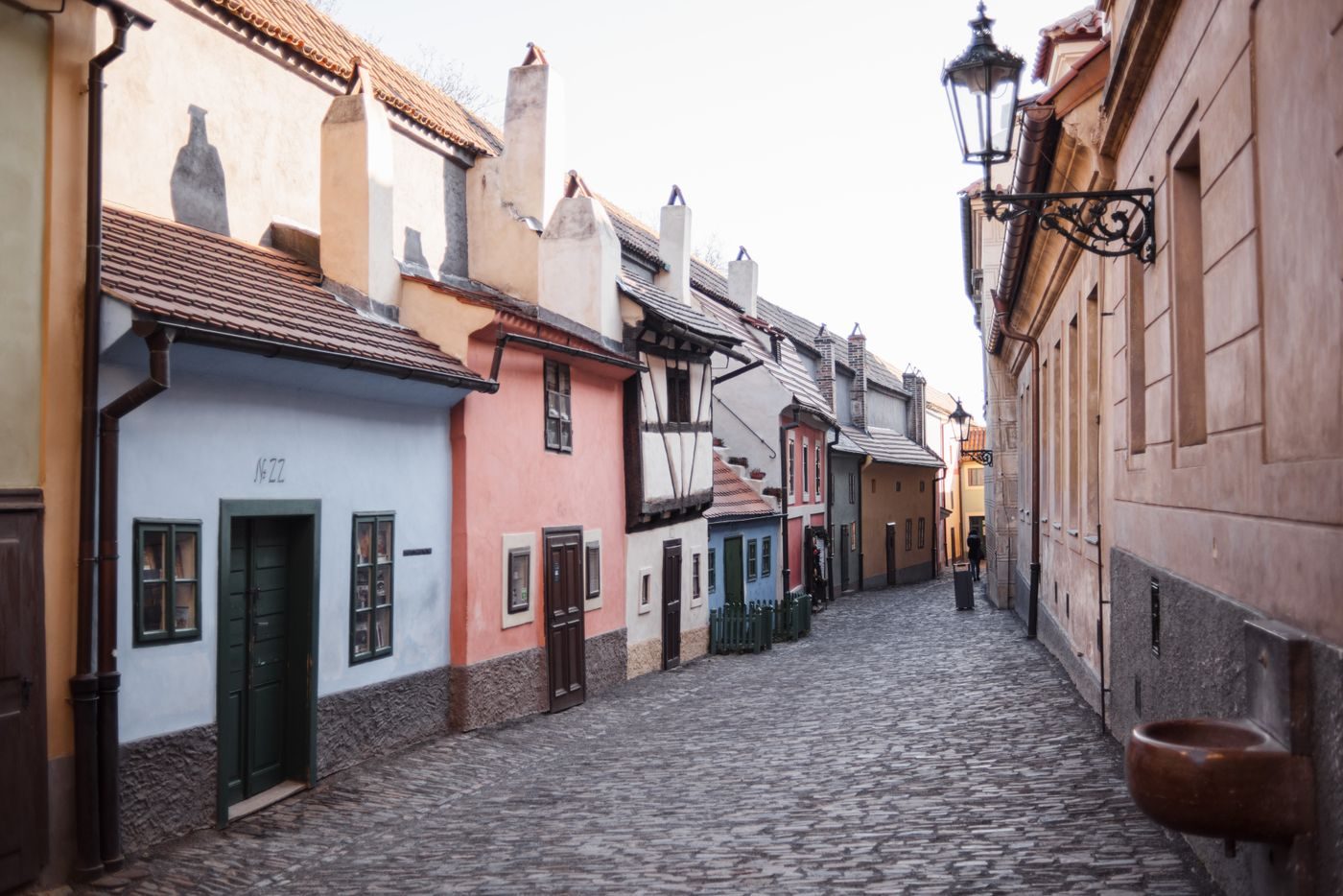 Exact Golden Lane houses/cobbles are visibly shown.